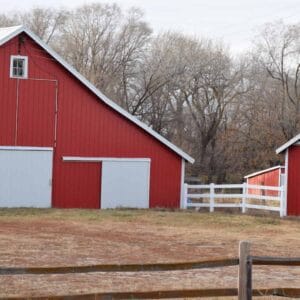 red barn with white doors