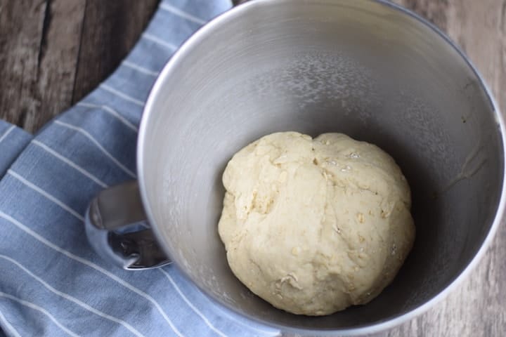 bread dough ball in a stand mixer bowl