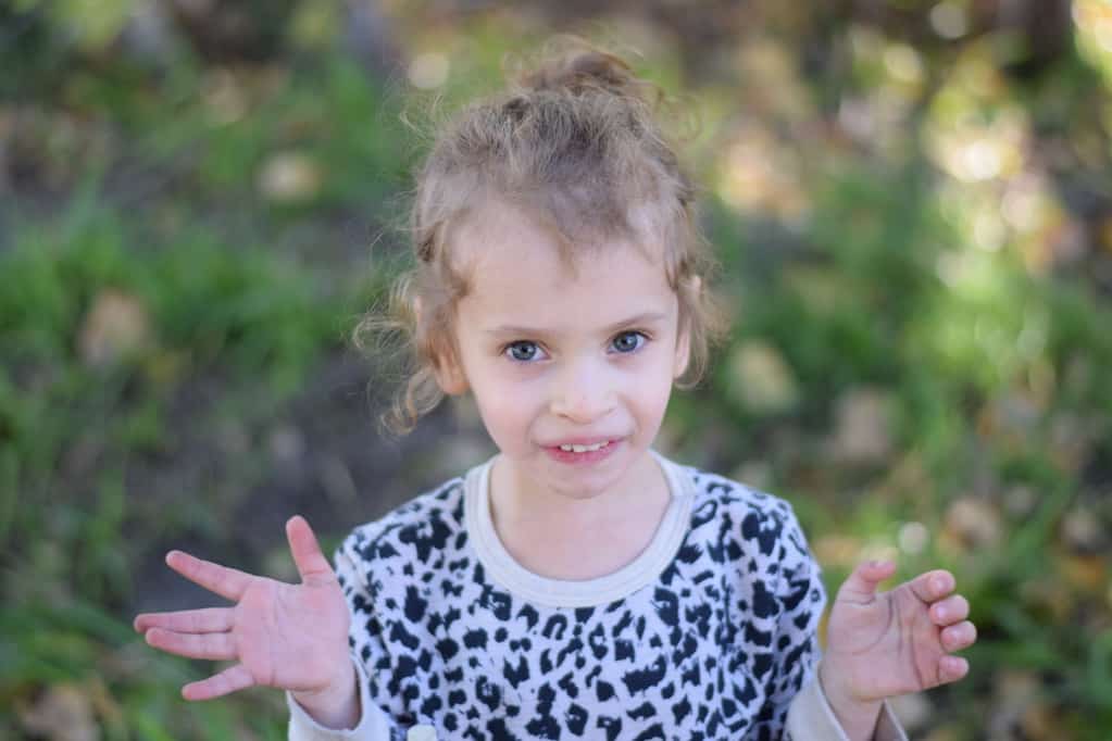 little girl in garden