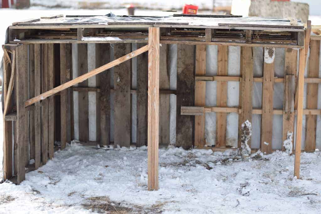 finished goat shelter with support beams