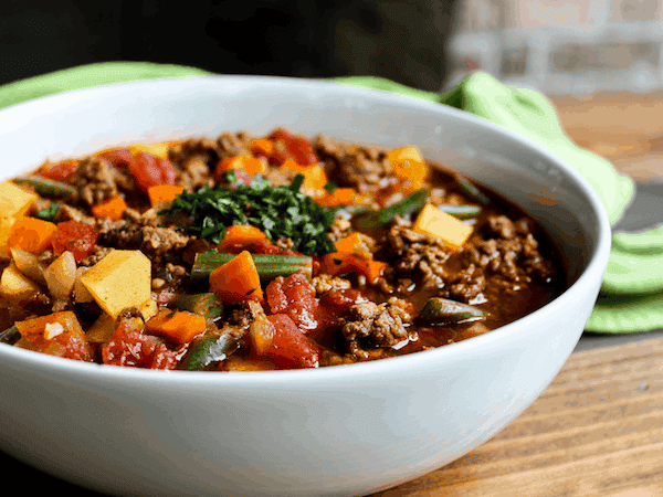 Close up view of the healthy hamburger soup in a white bowl