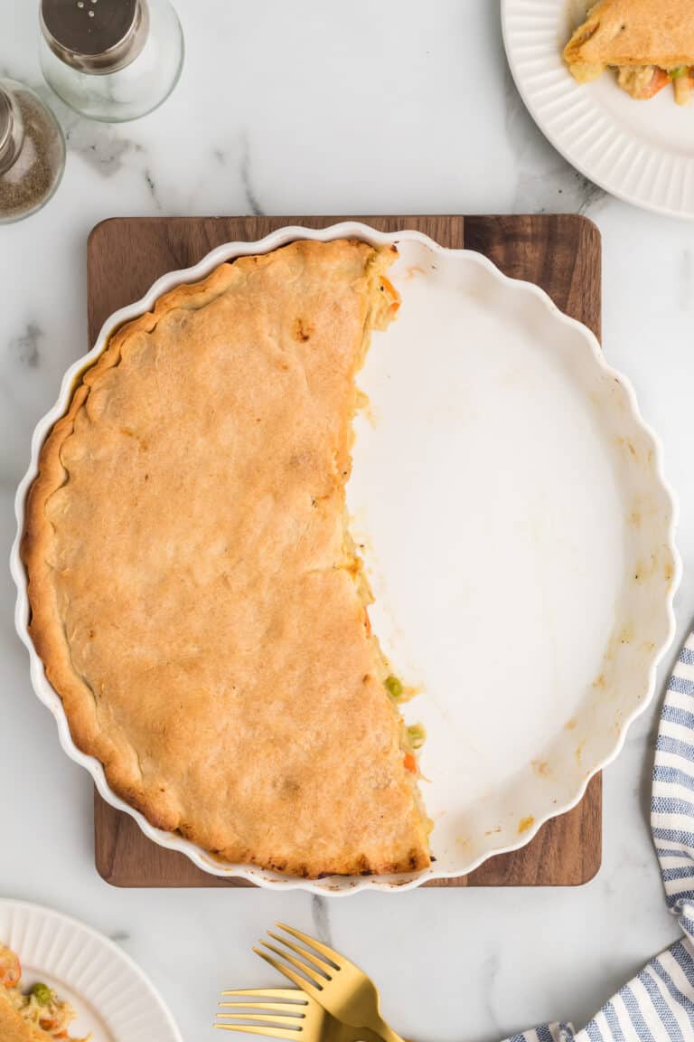 half of the pot pie leftover in the pie dish.