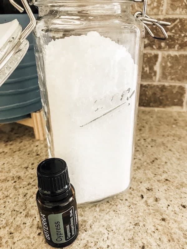 jar of Epsom Salt and essential oils bottle