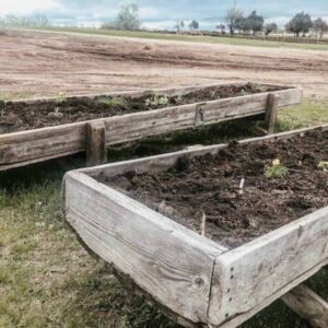 raised garden bed planters from old cattle feed bunks