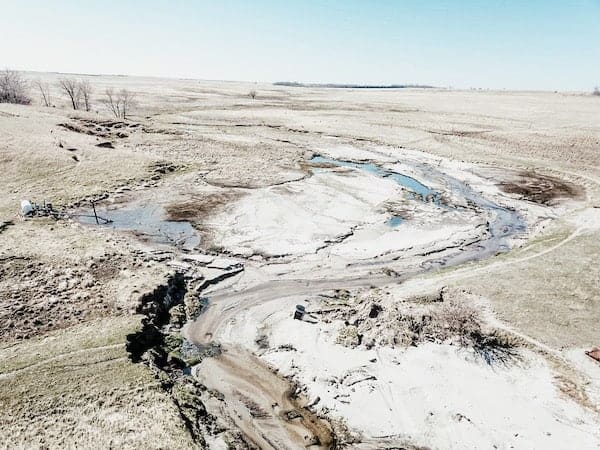 drone view of aftermath of recent flooding on the ranch