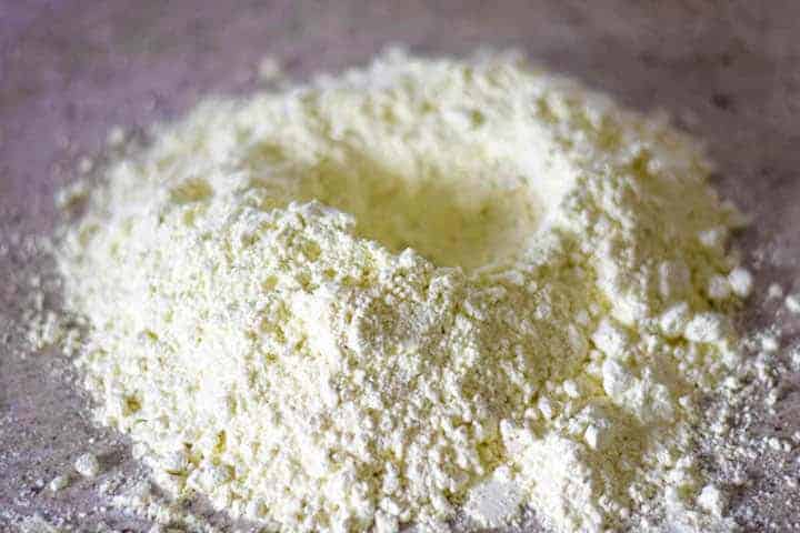 flour with well for pizza dough
