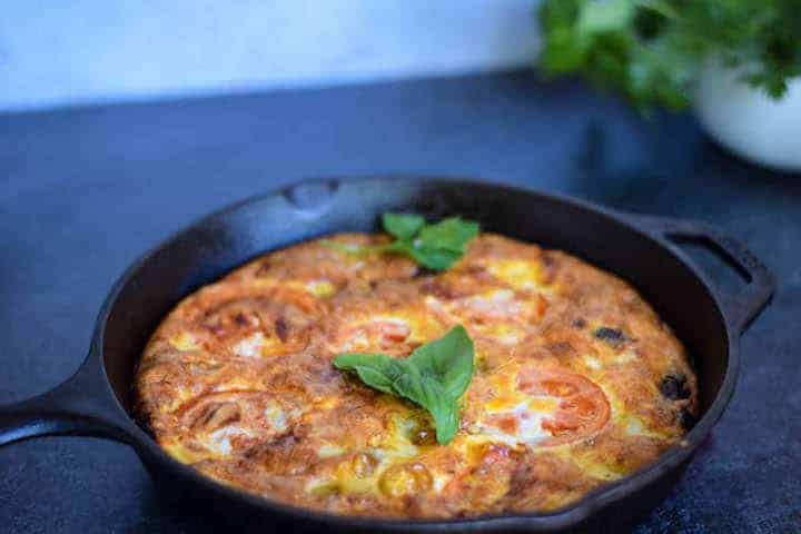 mediterranean frittata in a cast iron skillet