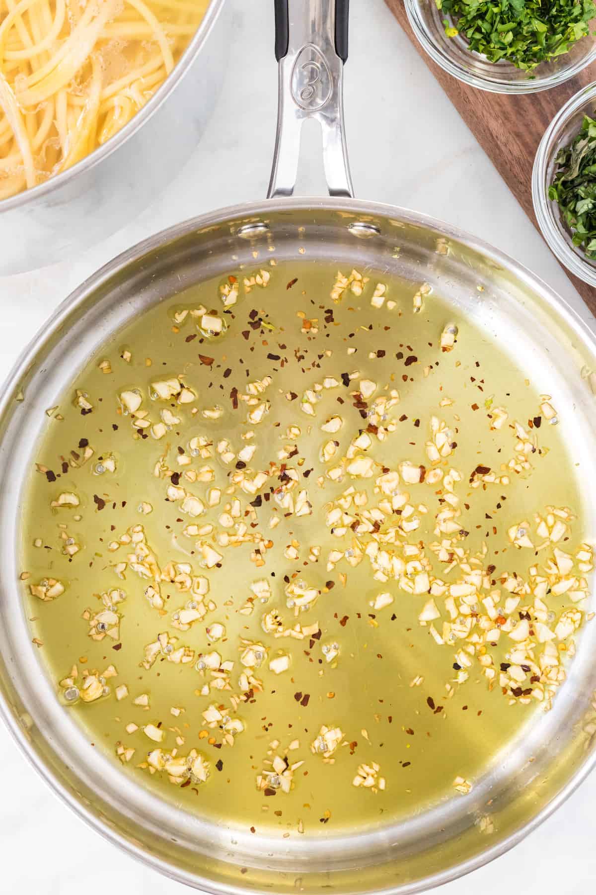 skillet of olive oil, garlic, and red pepper flakes