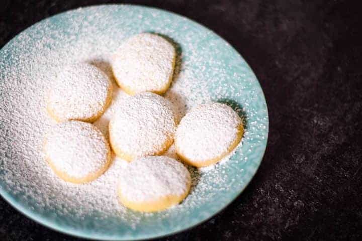 greek butter cookies on a blue plate