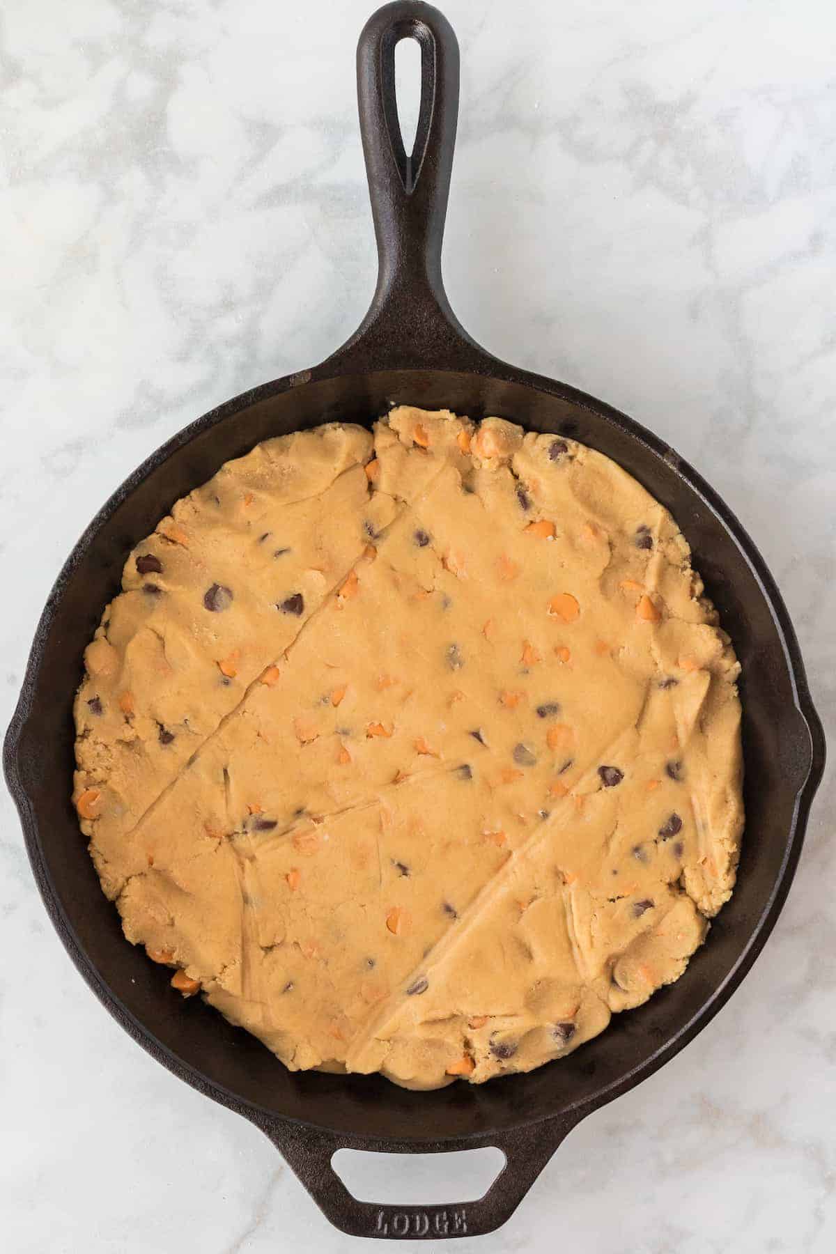 the cookie dough added to the cast iron skillet