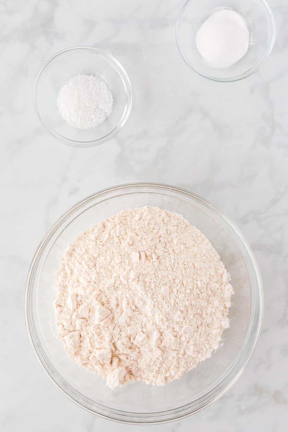 flour and dry ingredients in small glass bowls