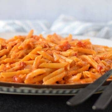 creamy pomodoro sauce with pasta on platter