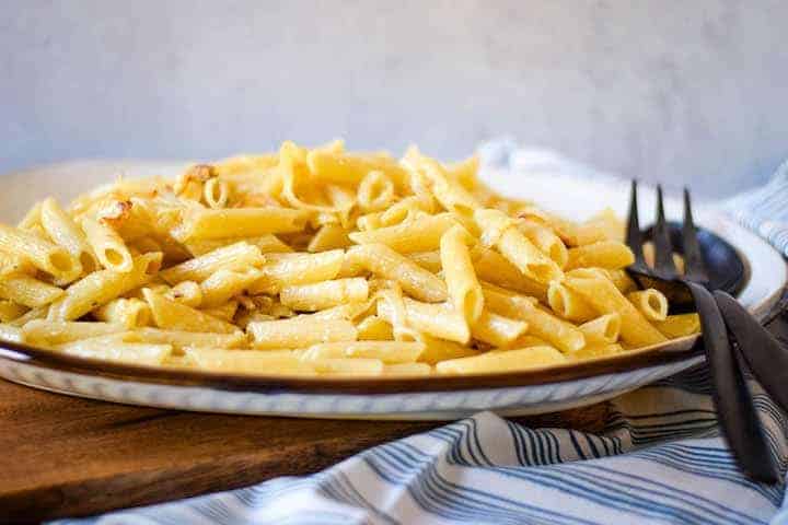 caramelized onion pasta on platter