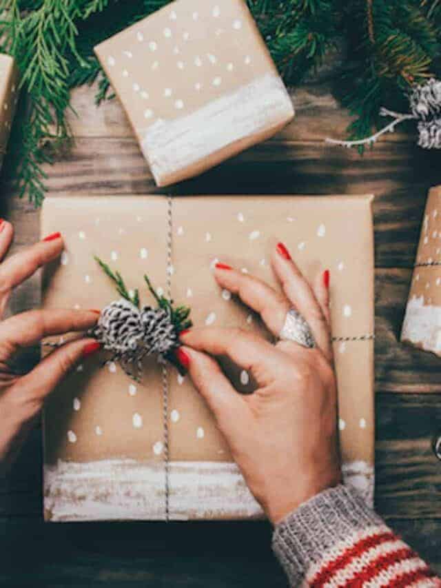 tying a piece of twine around a christmas gift