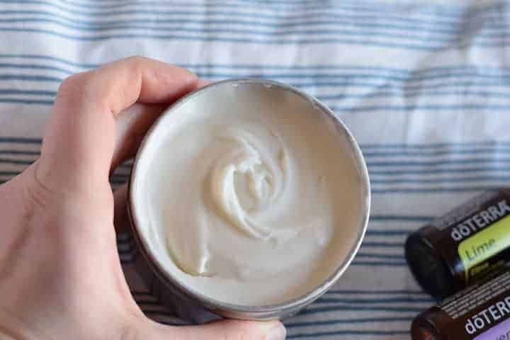 homemade body butter in a metal tin