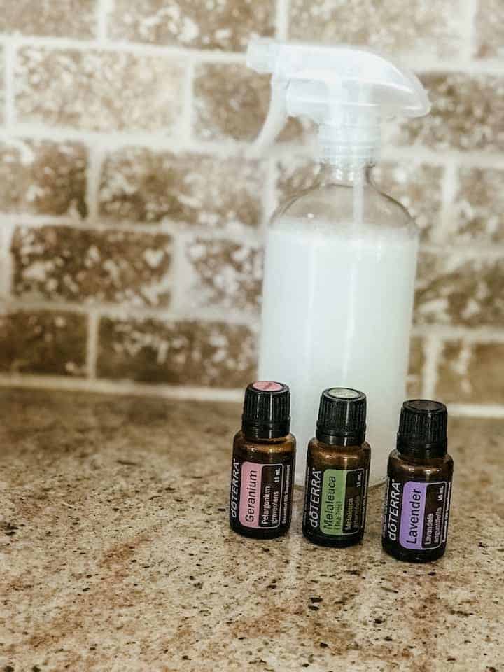 homemade leave in conditioner with essential oil bottles