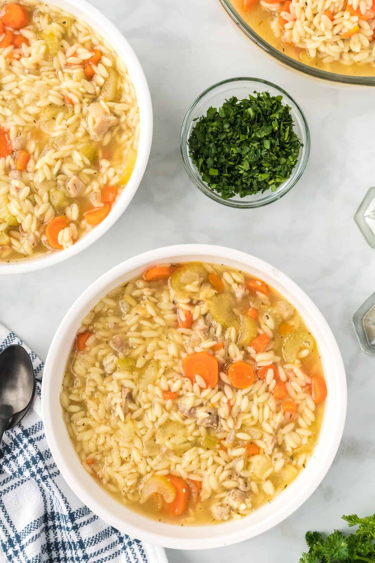 Ninja Foodi chicken soup with orzo pasta in white bowls