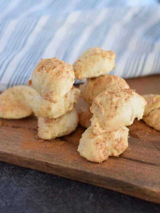 almond scones on wooden cutting board
