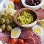 antipasto platter spread over a white tray