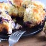 blueberry bread pudding on a wooden cutting board