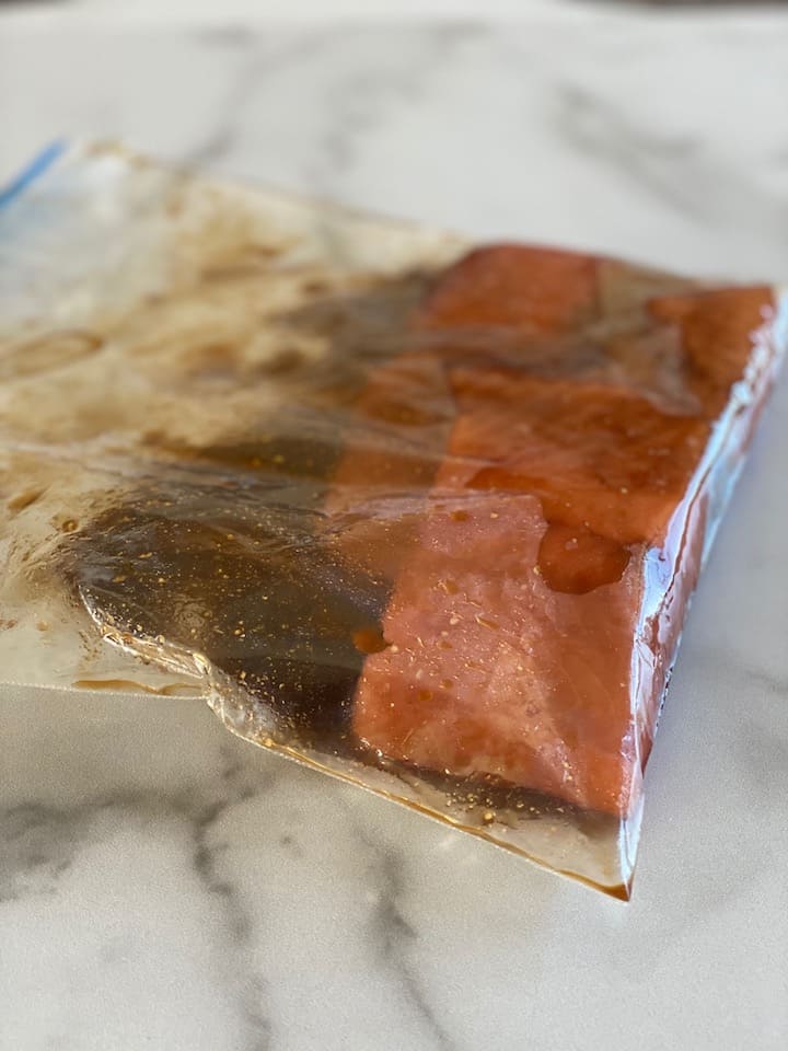 salmon and marinade in a large ziplock bag