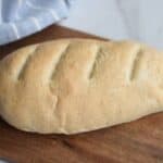italian bread loaf on a wooden board