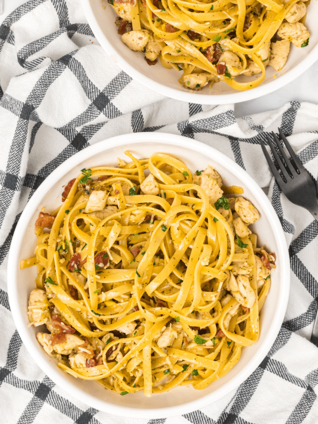 two white bowls of chicken bacon carbonara