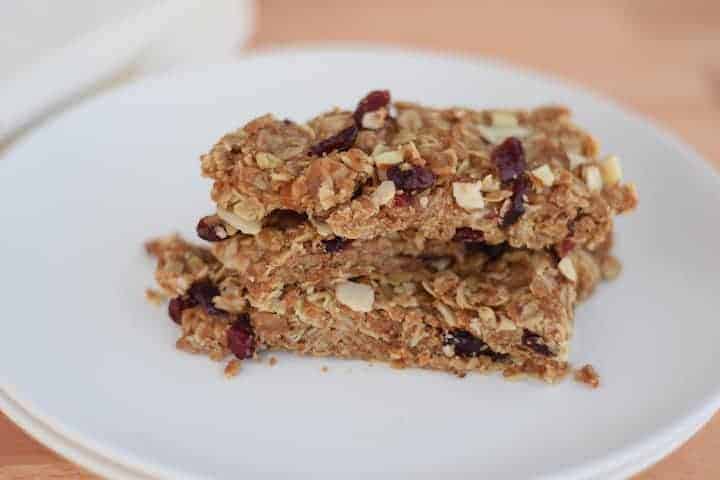 stack of granola bars on white plate