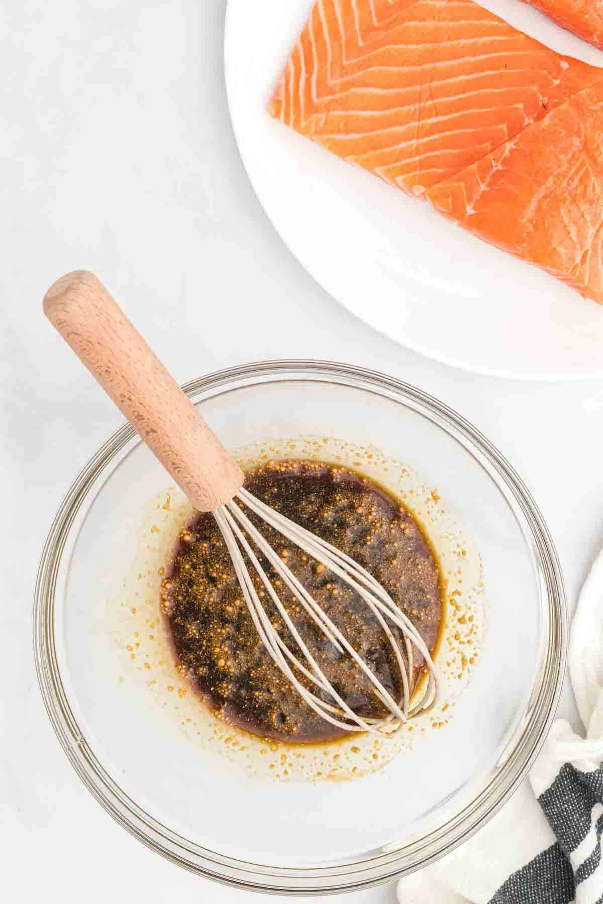 making the marinade in a large bowl and using a whisk for the smoked traeger salmon 