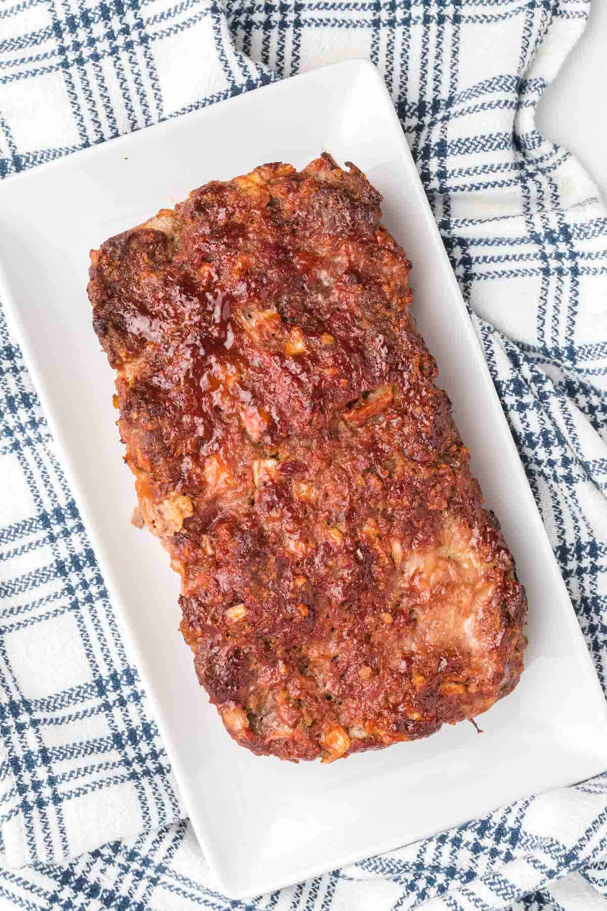 white platter with the smoked meatloaf 