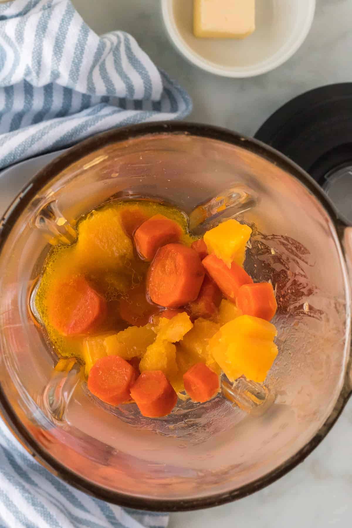 adding the soup mixture to the blender