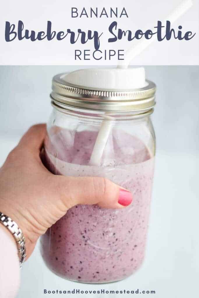 close up image of the blueberry smoothie in a mason jar