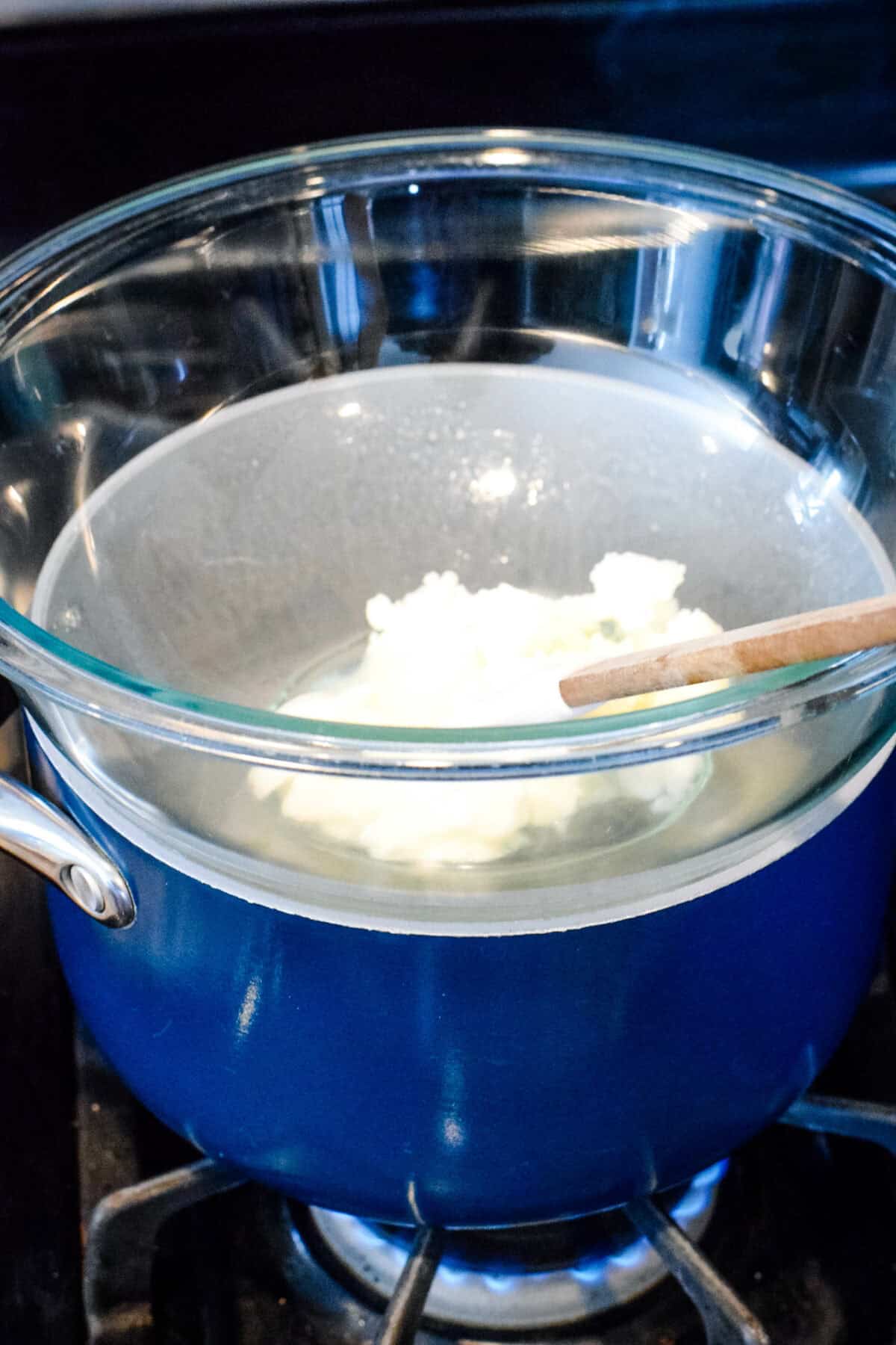 mixing the natural deodorant in a glass bowl set not top of the double boiler. 