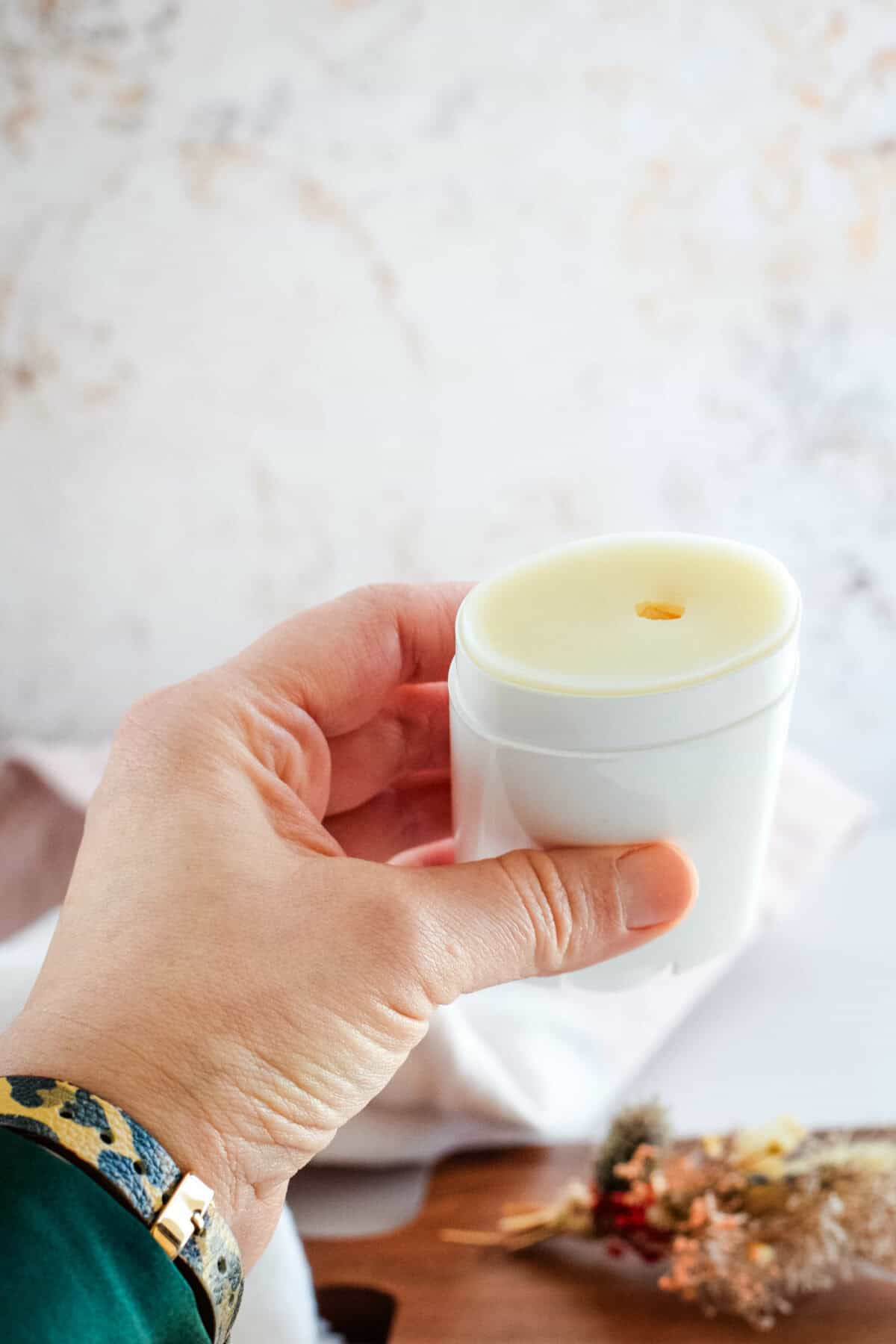 finished and cooled natural deodorant in a white container. 