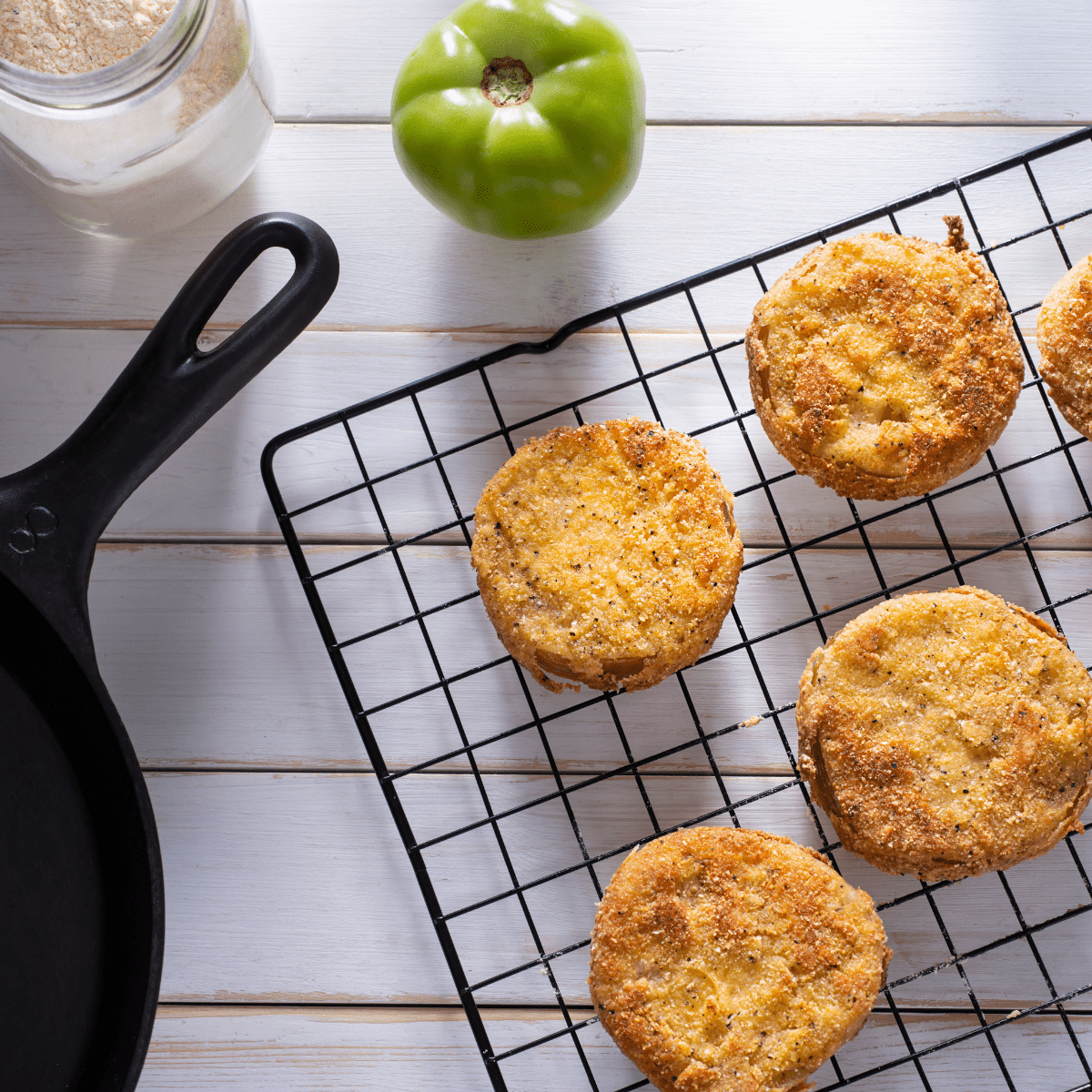 fried green tomatoes on a wire rack