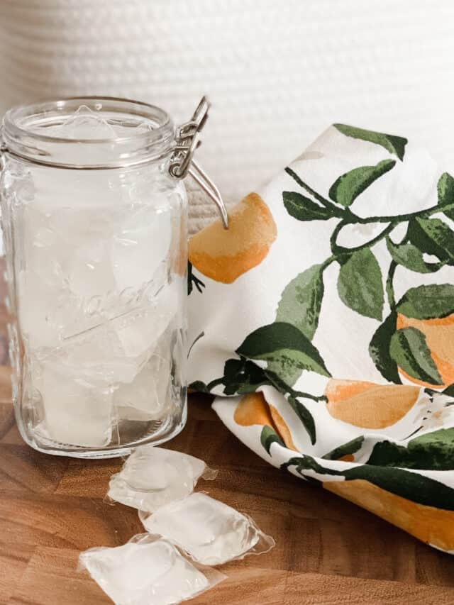 flip top mason jar filled with natural laundry detergent pods