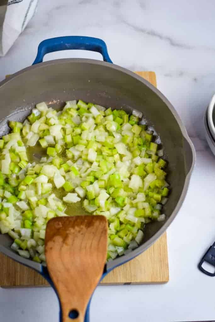 celery and onions in saute pan with butter 