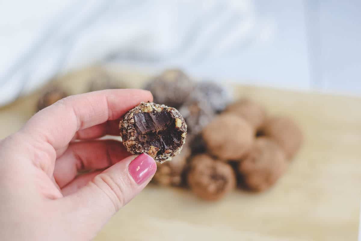 the bite shot of these homemade healthy chocolate truffles