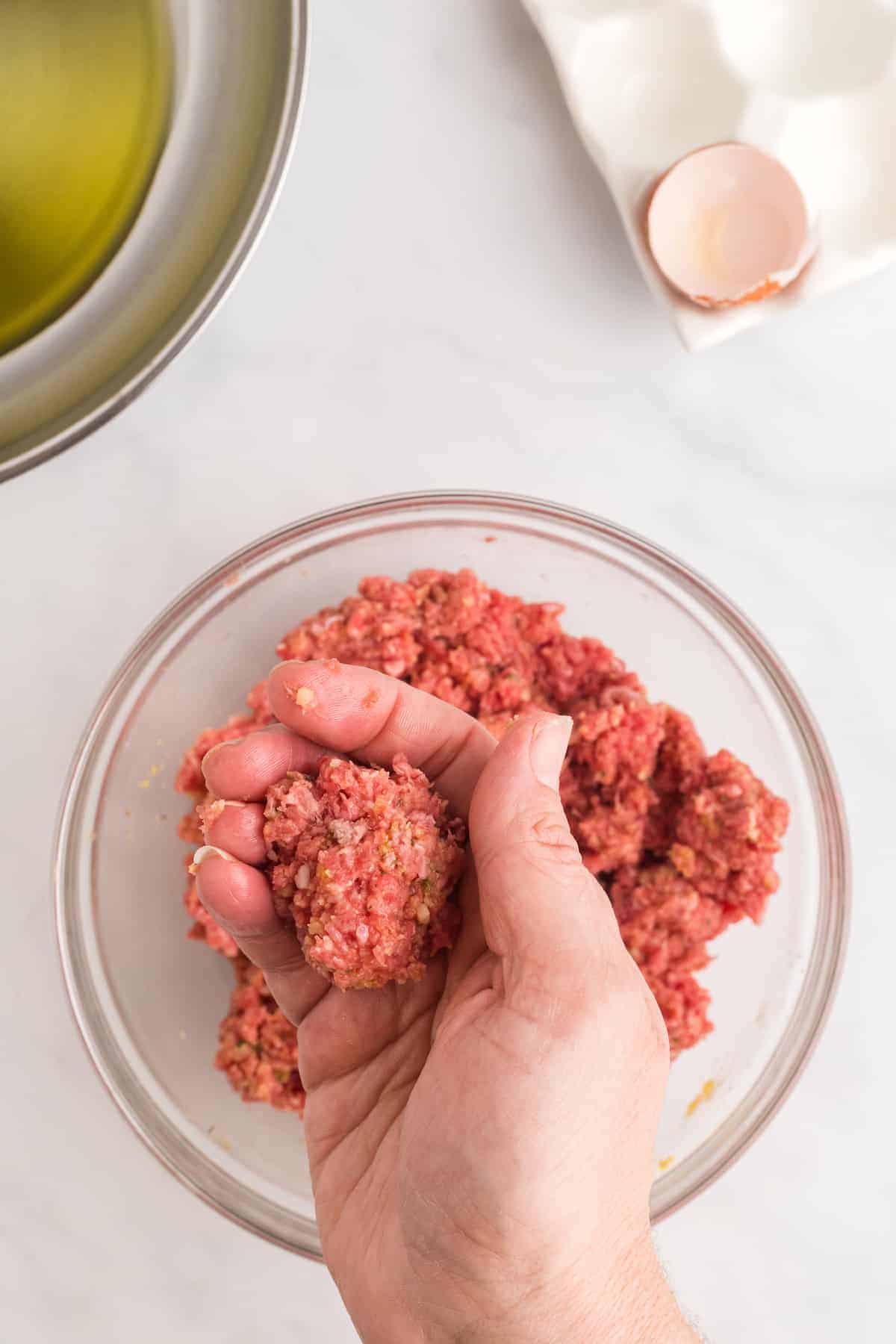 forming the meatballs in hand