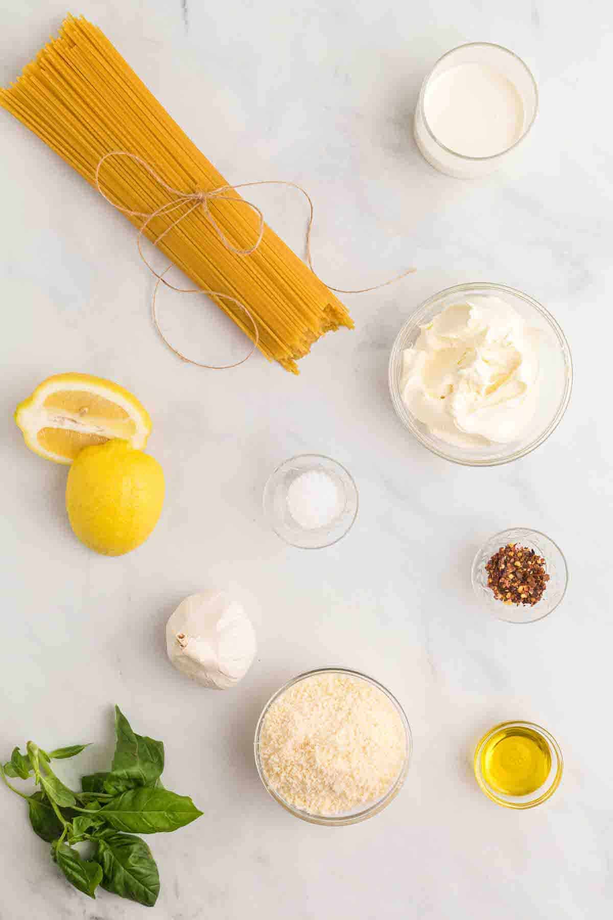 ingredients for creamy lemon pasta in small bowls