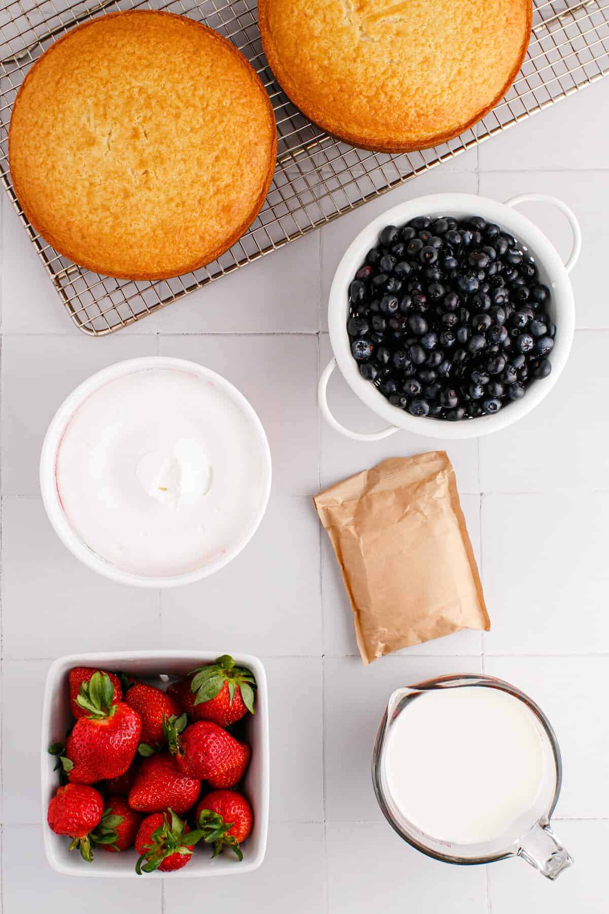 ingredients for the berry trifle in small bowls
