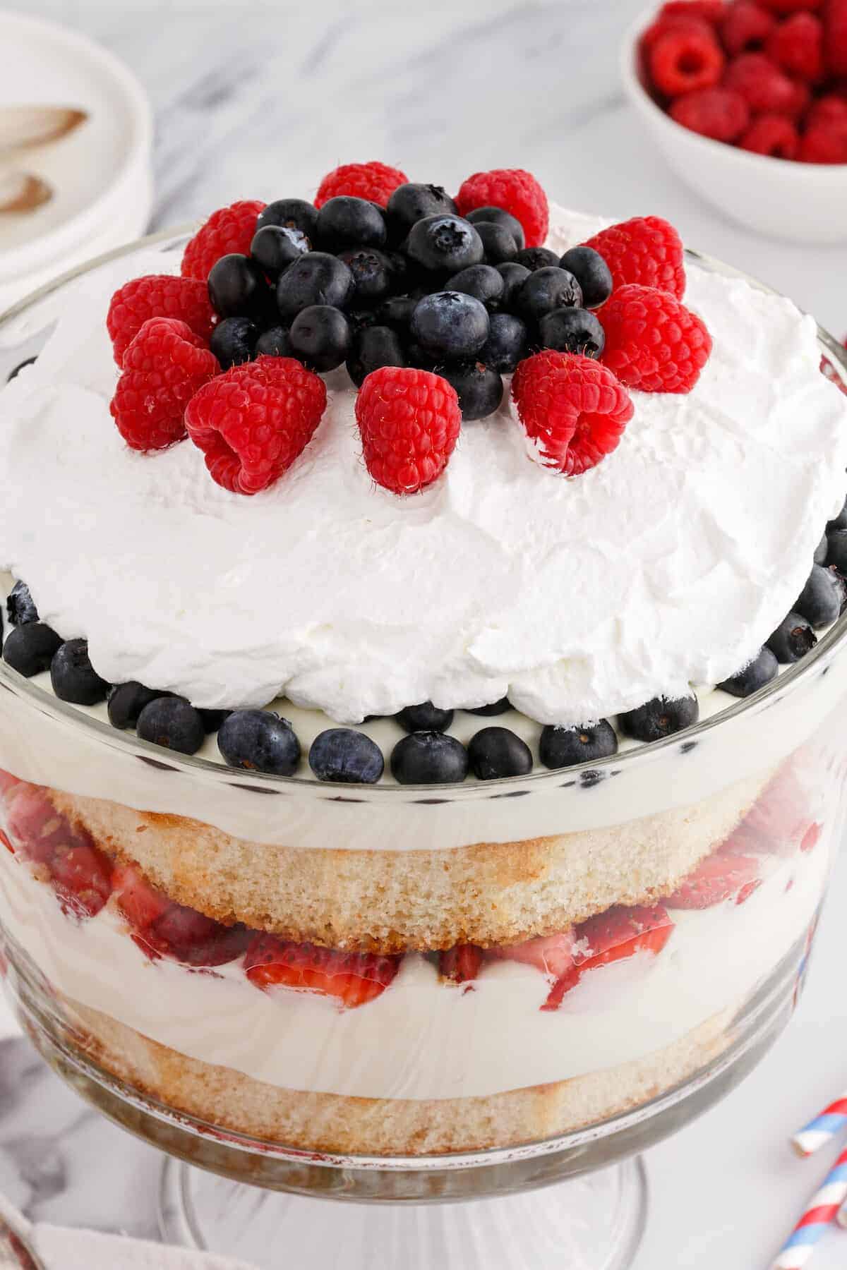 cake and berry layers with whipped cream and pudding layered in between. 