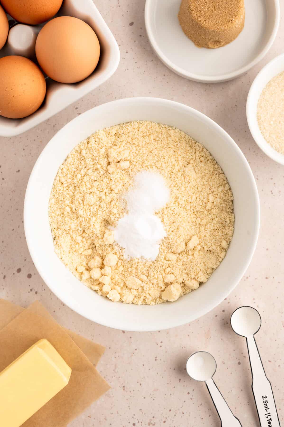 almond flour with dry ingredients in the mixing bowl. 