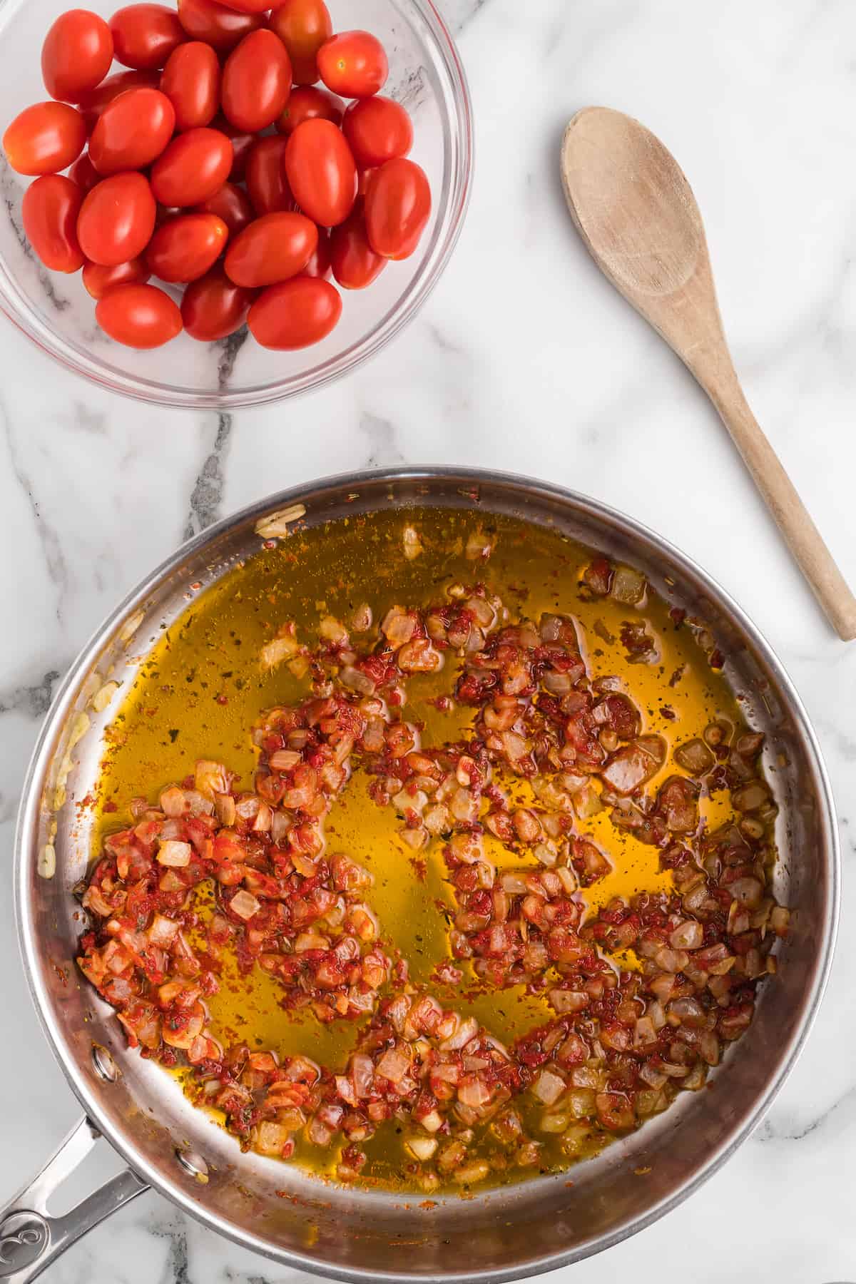 tomato paste added to the skillet.