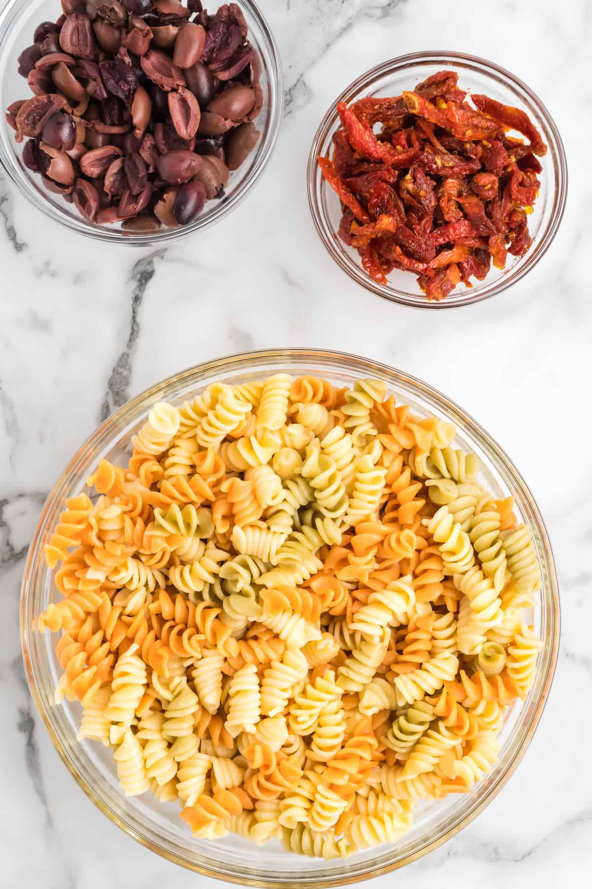 cooked pasta in a glass bowl.