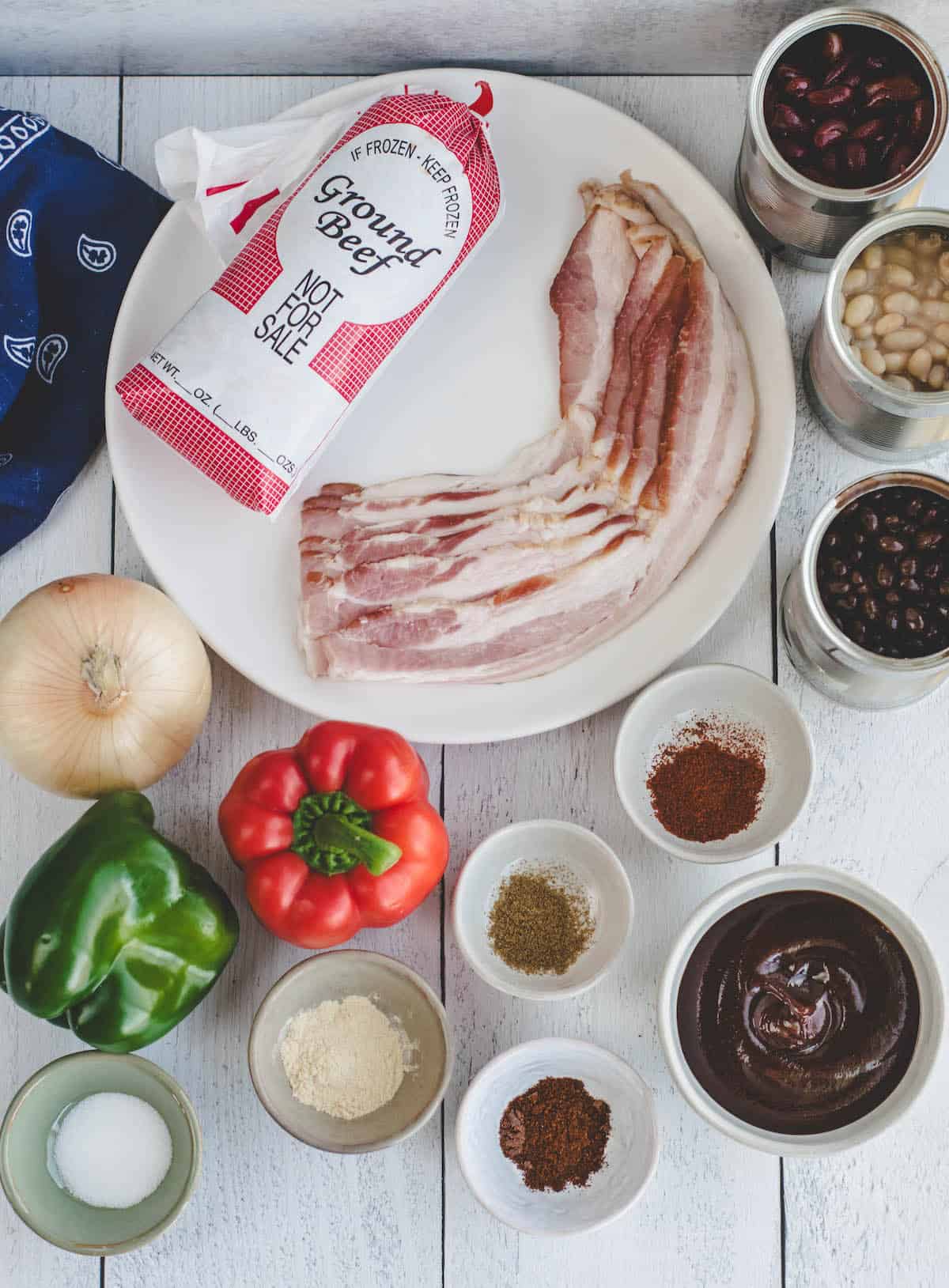 ingredients for the cowboy beans in small bowls.