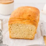 fresh homemade sandwich bread on a wire rack.