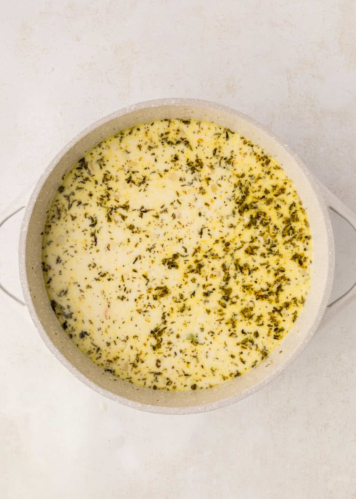 heavy cream added to the chicken broth mixture. 