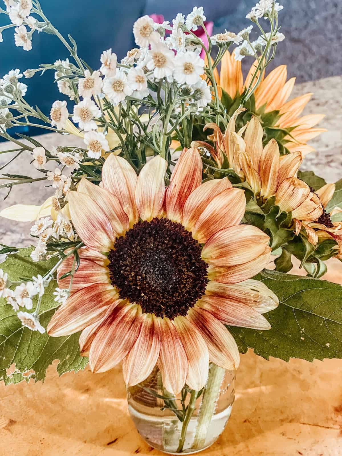 bouquet of sunflowers and yarrow.