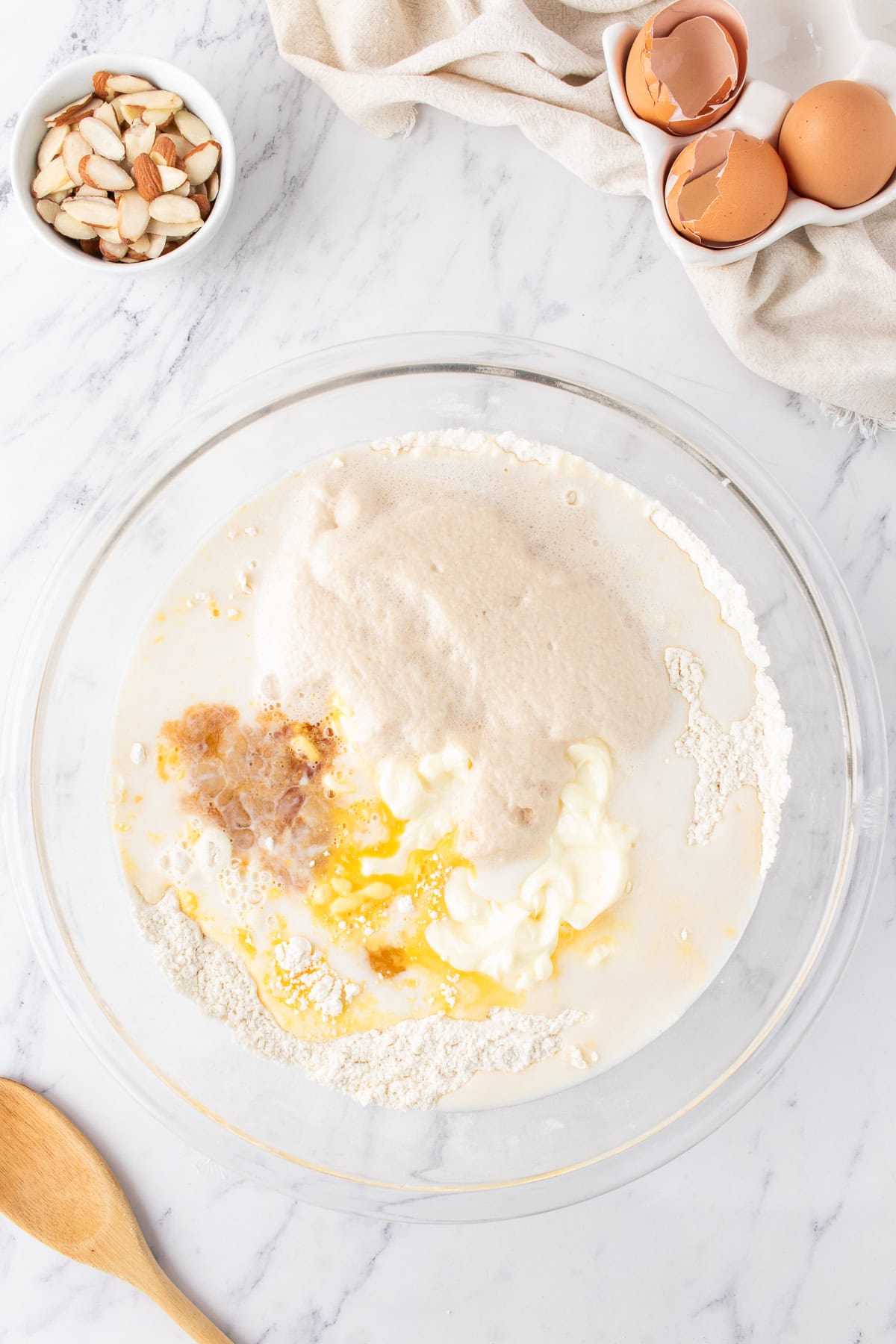 flour mixture with wet ingredients in a large bowl.